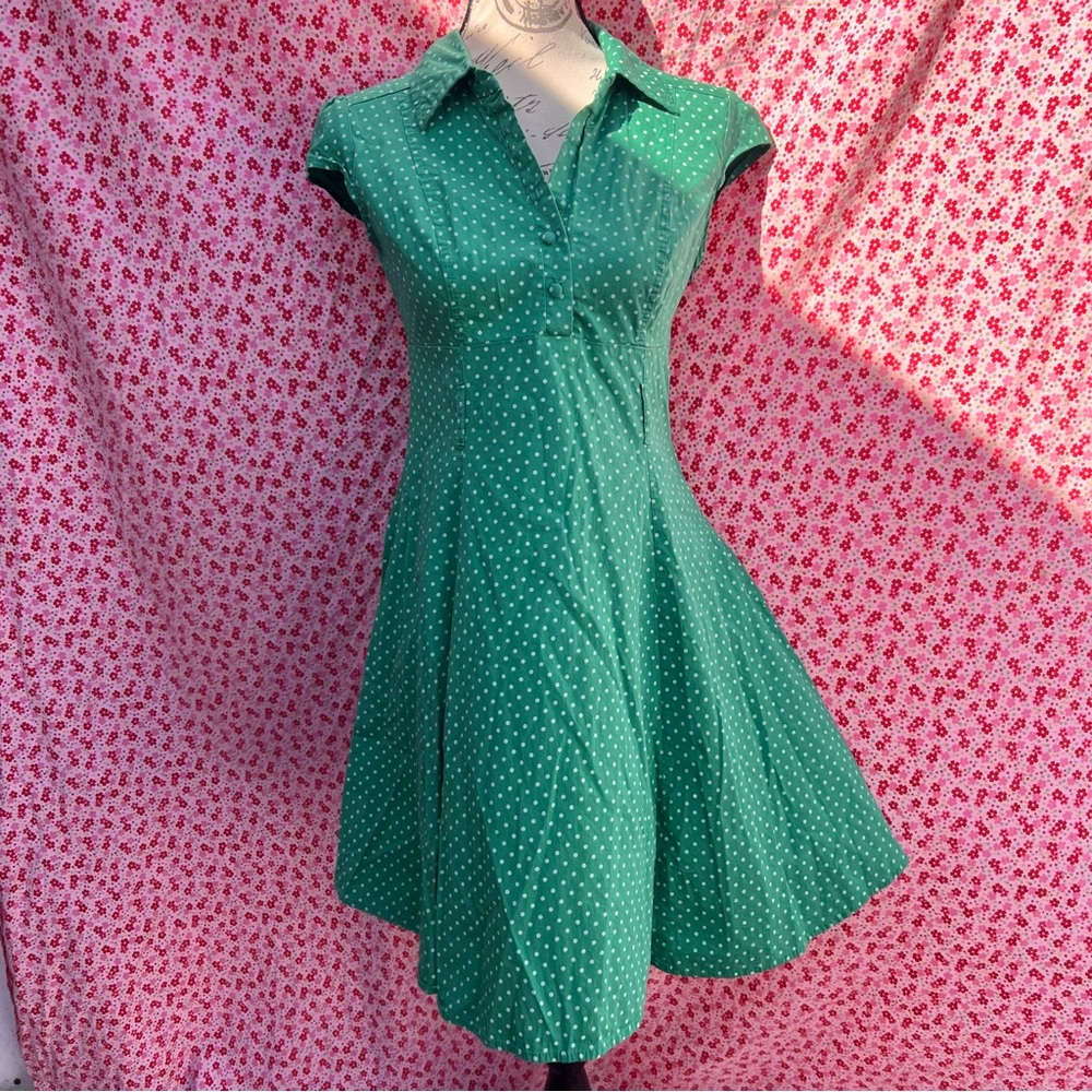 “Tropical wear” green collared dress with white polka dots and puffed sleeves